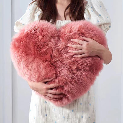 Morbido cuscino in lana a forma di cuore