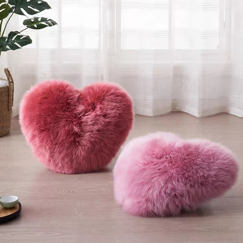 Morbido cuscino in lana a forma di cuore