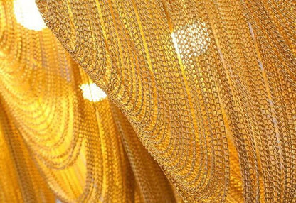 Lampadario Libby con nappe lineari irregolari in oro/argento